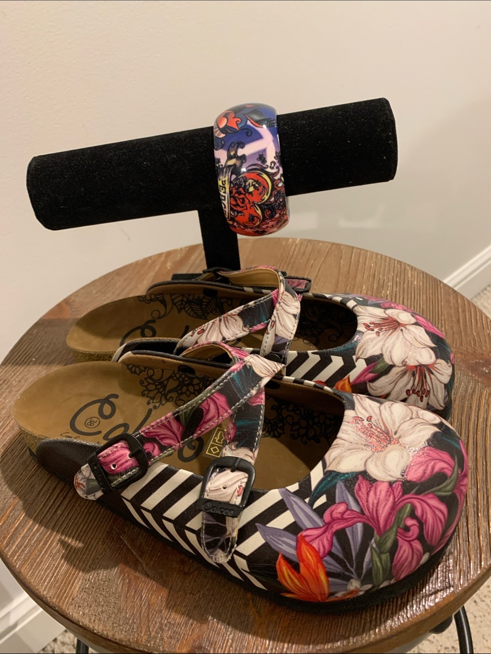 Calceo Women’s Floral Mary Jane Moccasins in Pink and Black with bracelet
